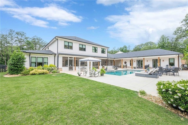 6301 New Bethany Rd, Buford, GA 30518 - back of property with a patio, a yard, and an outdoor pool