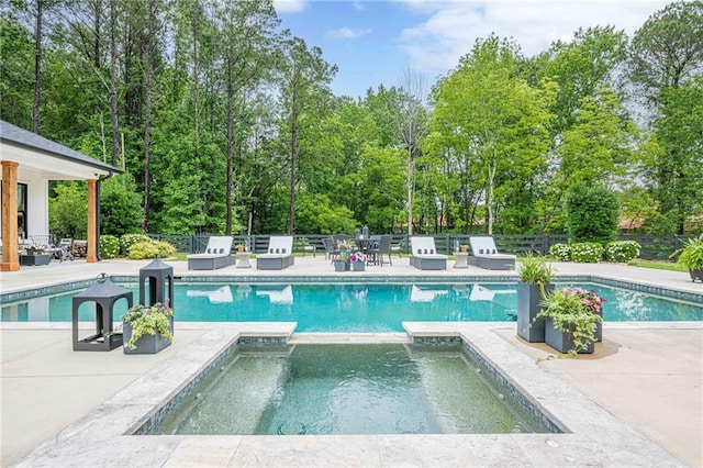 6301 New Bethany Rd, Buford, GA 30518 - view of pool with a patio area, a pool with connected hot tub, and view of wooded area
