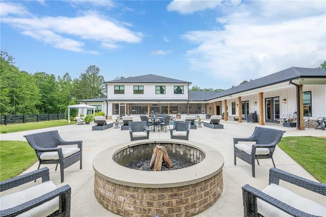 6301 New Bethany Rd, Buford, GA 30518 - view of patio / terrace with an outdoor living space with a fire pit