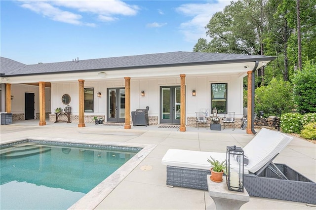 6301 New Bethany Rd, Buford, GA 30518 - rear view of house with french doors, board and batten siding, a shingled roof, a patio area, and an outdoor pool