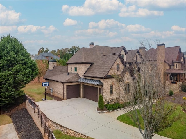 view of front of property with a garage