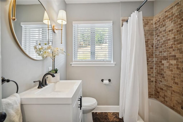 full bathroom featuring shower / bath combo, toilet, and vanity