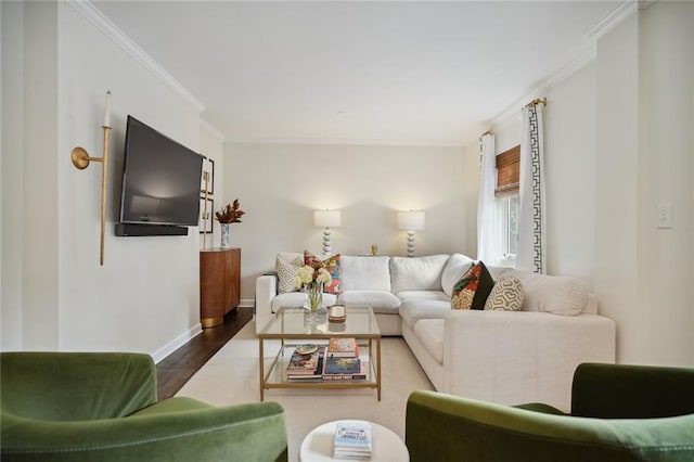 living room featuring hardwood / wood-style floors and ornamental molding