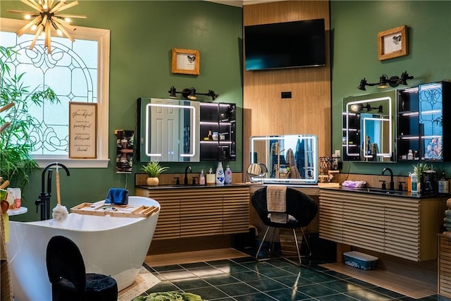 interior space featuring a sink and an inviting chandelier