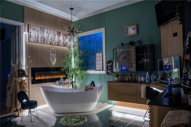 interior space with crown molding, a glass covered fireplace, and tile patterned floors