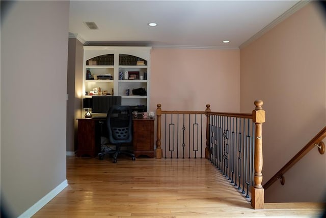 home office featuring recessed lighting, visible vents, ornamental molding, and wood finished floors