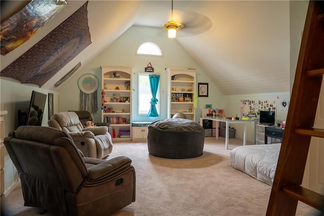interior space with carpet flooring, a ceiling fan, and lofted ceiling