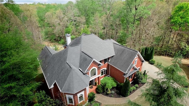 drone / aerial view with a forest view