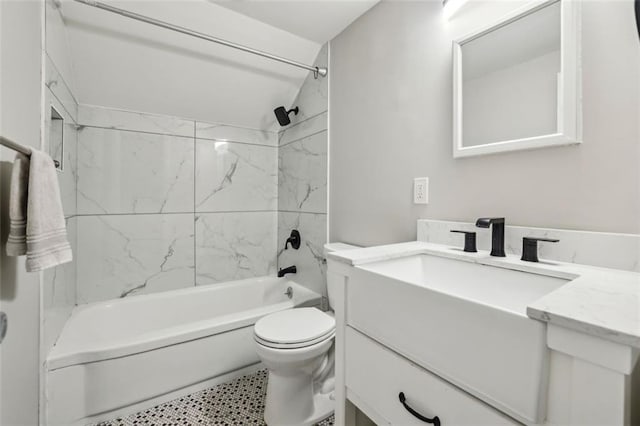 full bathroom featuring toilet, washtub / shower combination, and vanity