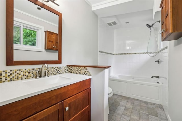 bathroom with toilet, shower / bath combination, decorative backsplash, and vanity