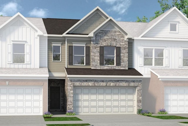 20 Jacobs Farm Ln Unit 10, Lawrenceville, GA 30045 - view of front of house featuring stone siding, board and batten siding, driveway, and a garage