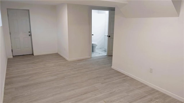 empty room with light wood-type flooring