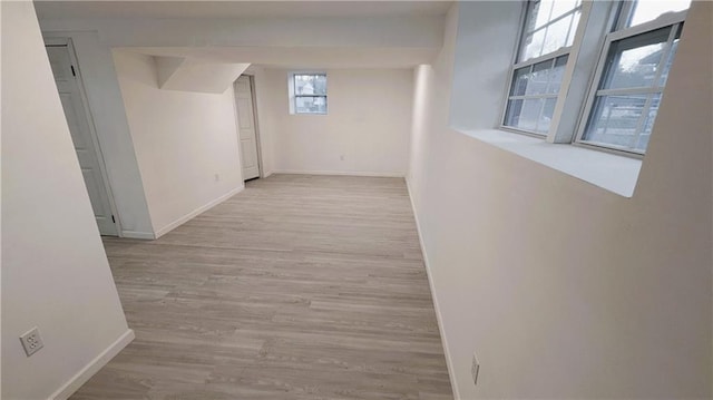 corridor featuring light wood-type flooring