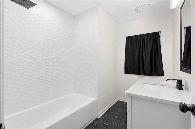 bathroom featuring vanity, bathtub / shower combination, and tile patterned flooring