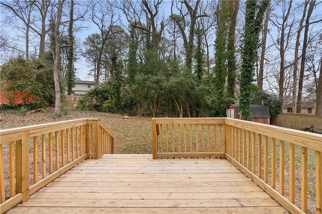 wooden terrace with a storage unit