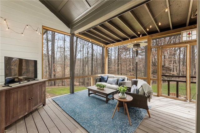 sunroom with lofted ceiling