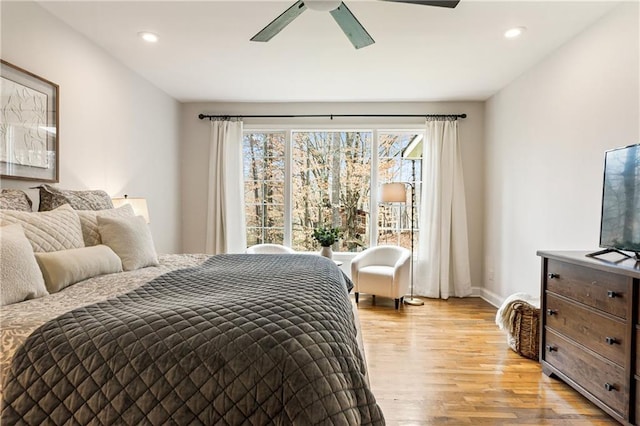 bedroom with light wood-style floors, recessed lighting, baseboards, and a ceiling fan