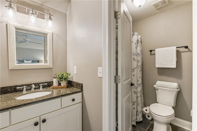 full bathroom with visible vents, a shower with shower curtain, toilet, vanity, and baseboards