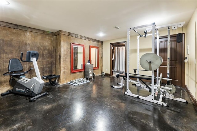 exercise area with baseboards