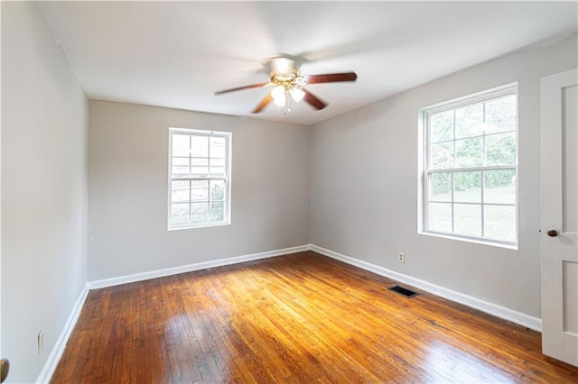 2656 Northview Ave, Decatur, GA 30032 - unfurnished room featuring a ceiling fan, visible vents, plenty of natural light, and hardwood / wood-style floors