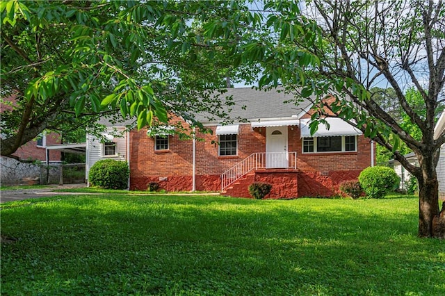 2656 Northview Ave, Decatur, GA 30032 - ranch-style home featuring brick siding, an attached carport, driveway, and a front yard