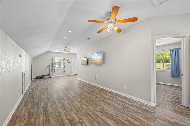 unfurnished living room with baseboards, a ceiling fan, and wood finished floors