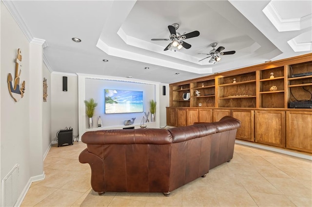 living room with a raised ceiling, a ceiling fan, recessed lighting, light tile patterned floors, and visible vents
