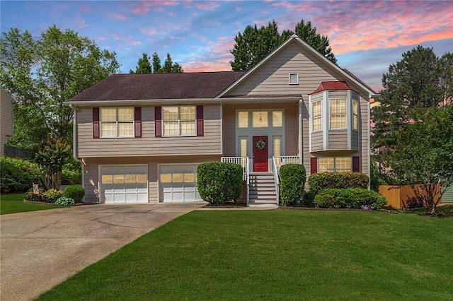 2577 Abbotts Glen Dr NW, Acworth, GA 30101 - split foyer home featuring concrete driveway and an attached garage