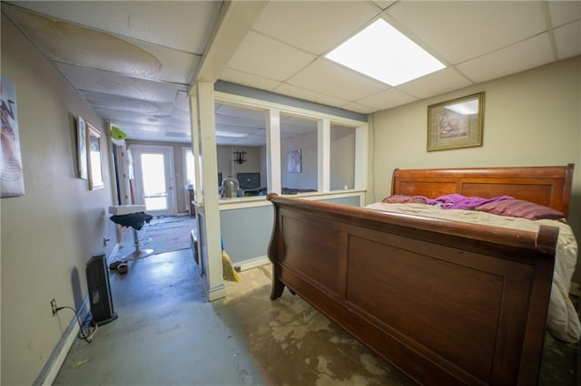 bedroom featuring a drop ceiling