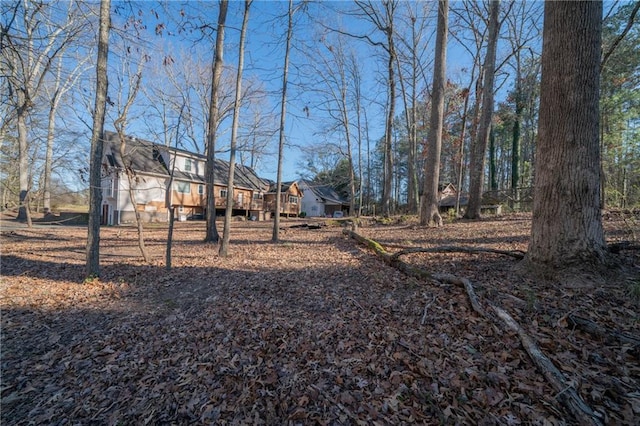 view of yard with a deck