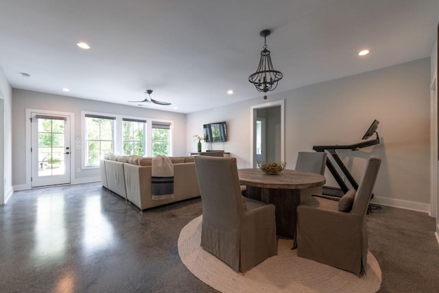 dining area with recessed lighting and baseboards