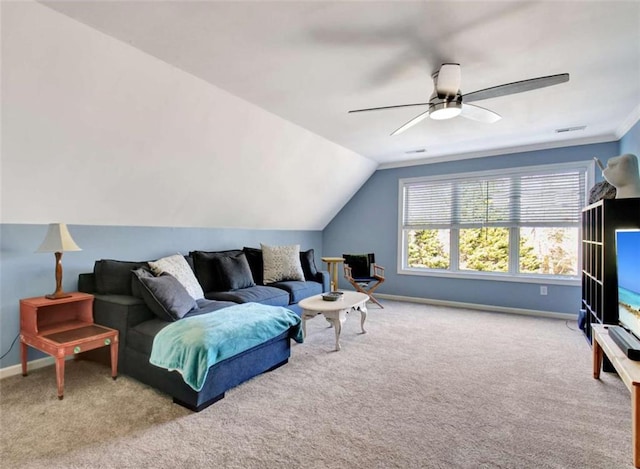 carpeted living room with ceiling fan and lofted ceiling