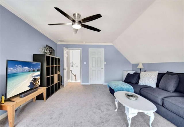 living room with lofted ceiling, carpet floors, ornamental molding, and ceiling fan