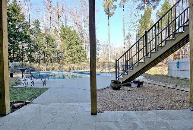 view of pool featuring a patio