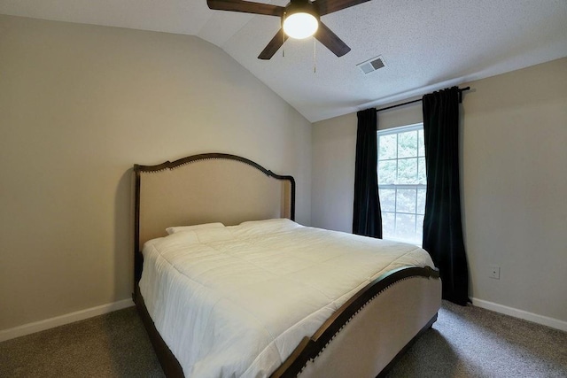 bedroom featuring visible vents, lofted ceiling, baseboards, ceiling fan, and carpet