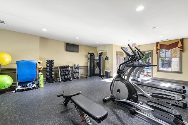 exercise room featuring recessed lighting and visible vents