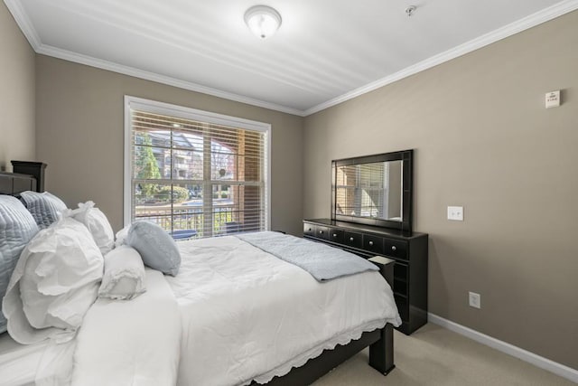 bedroom featuring baseboards, light carpet, and ornamental molding