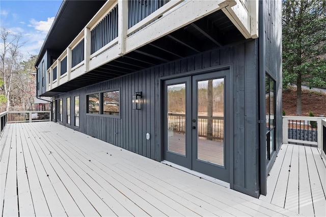 wooden terrace featuring french doors