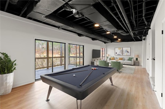 recreation room with billiards and light wood-type flooring