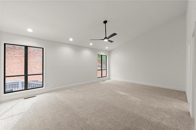 spare room with recessed lighting, visible vents, carpet floors, and a ceiling fan