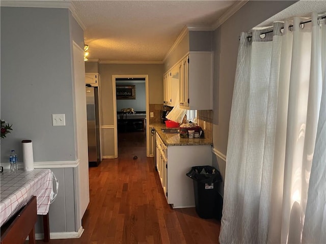 1159 Aurora Ct, Atlanta, GA 30338 - corridor with dark wood-style flooring, ornamental molding, and a textured ceiling