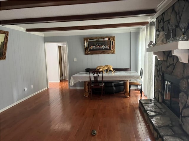1159 Aurora Ct, Atlanta, GA 30338 - dining space featuring beam ceiling, hardwood / wood-style flooring, a fireplace, and crown molding
