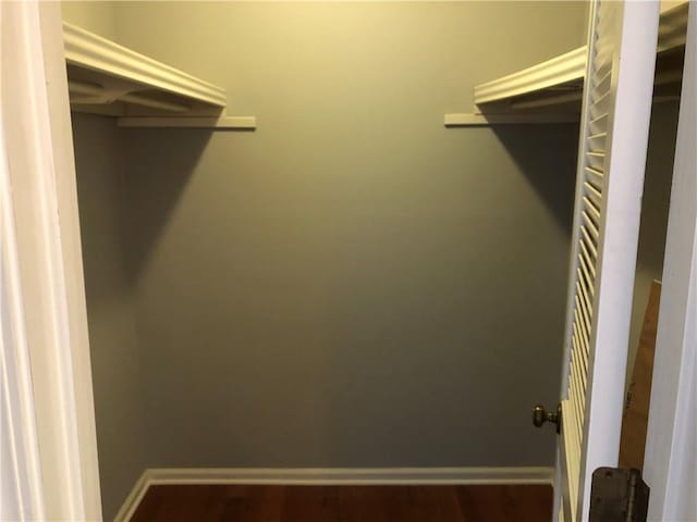 1159 Aurora Ct, Atlanta, GA 30338 - walk in closet with wood finished floors