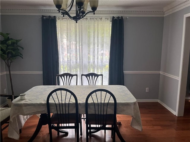 1159 Aurora Ct, Atlanta, GA 30338 - dining area featuring a chandelier, healthy amount of natural light, and wood finished floors