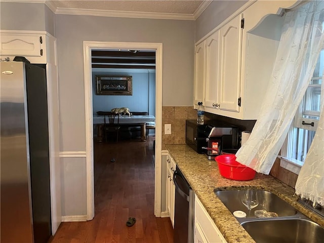 1159 Aurora Ct, Atlanta, GA 30338 - kitchen featuring appliances with stainless steel finishes, white cabinetry, dark wood-style floors, light stone counters, and crown molding