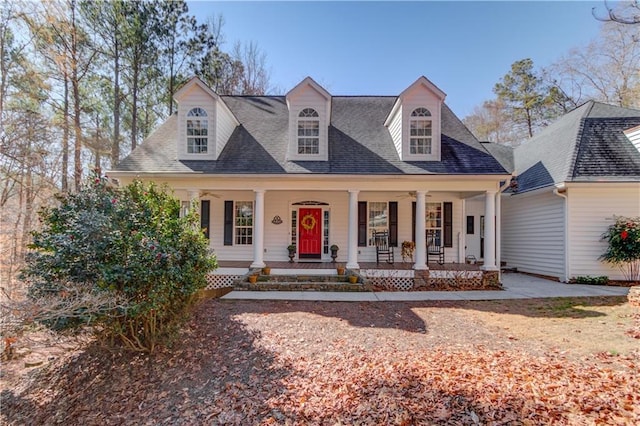 cape cod house with covered porch