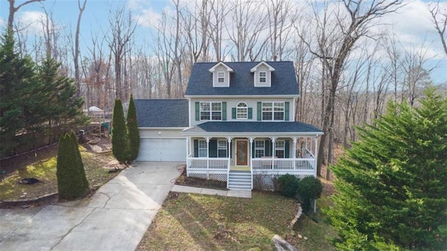 view of front of home with a garage and covered porch