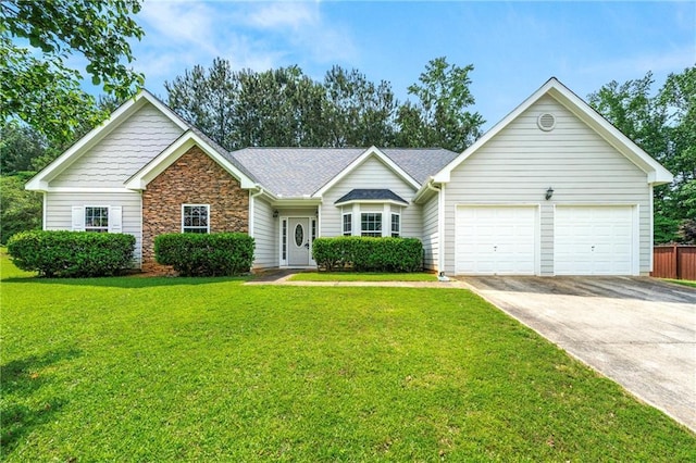 85 Old Gettysburg Way, Dallas, GA 30157 - ranch-style house featuring driveway, a garage, a front lawn, and stone siding