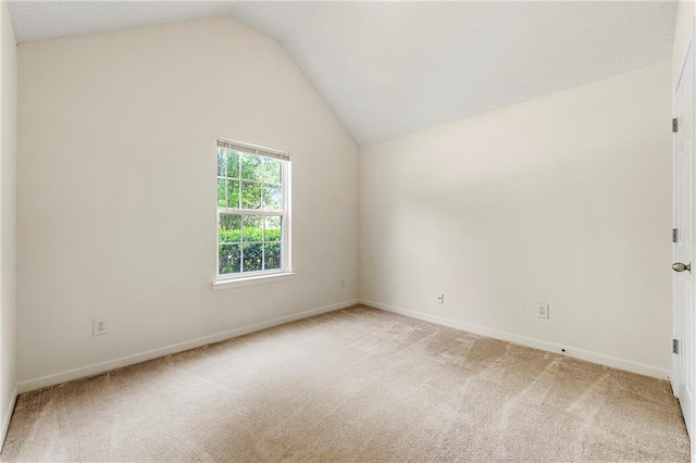 85 Old Gettysburg Way, Dallas, GA 30157 - spare room with light carpet, vaulted ceiling, and baseboards