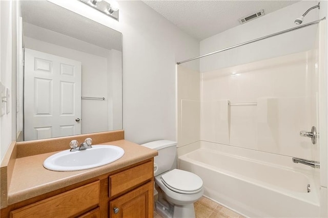 85 Old Gettysburg Way, Dallas, GA 30157 - bathroom with toilet, vanity, tub / shower combination, and a textured ceiling